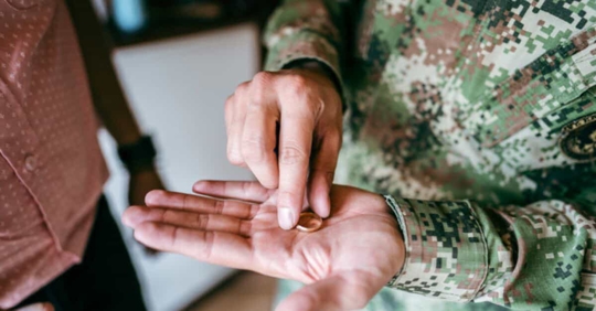 Solider with ring on their hand