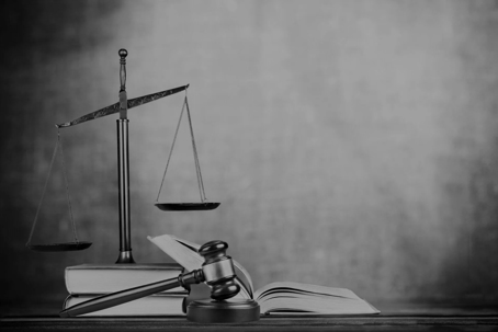 gavel and scales on desk