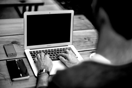 man searching on computer