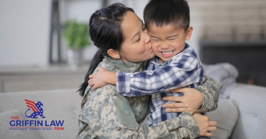military woman hugging her son